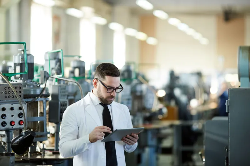 Adobe Stock factory worker lab coat 258815564 web